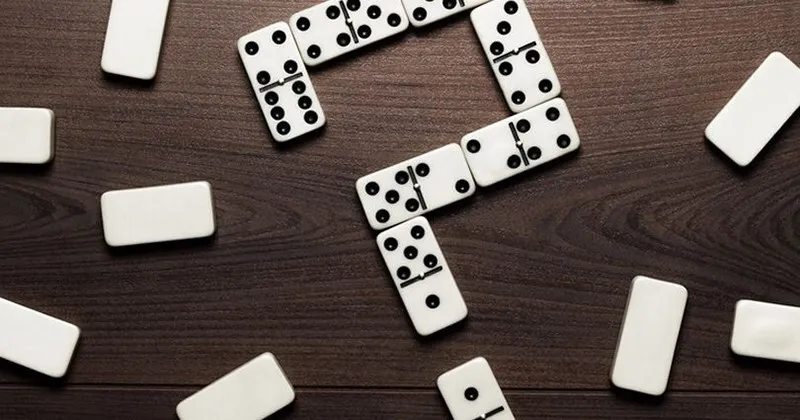 How to calculate winning points in Dominoes